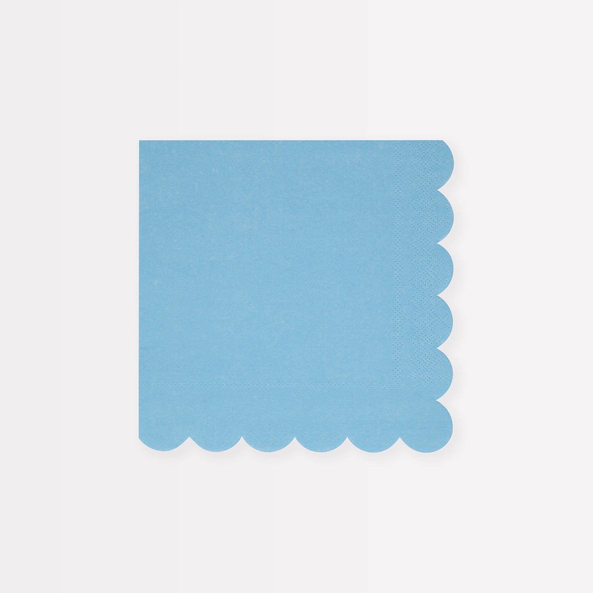 blue cocktail napkin with scalloped edge