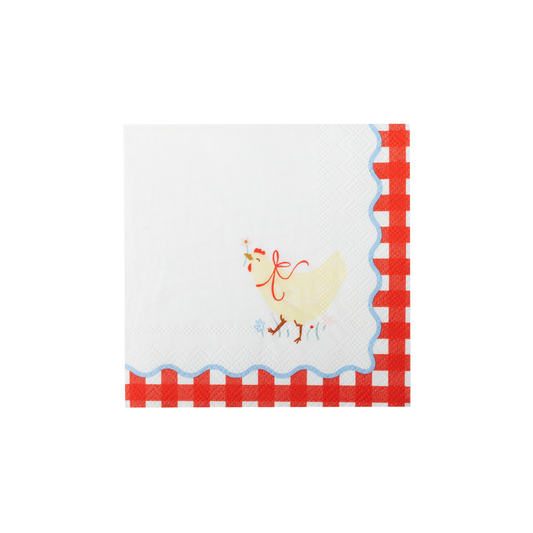 Countryside farm cocktail napkin with hen illustration, blue scalloped detail and red gingham border.