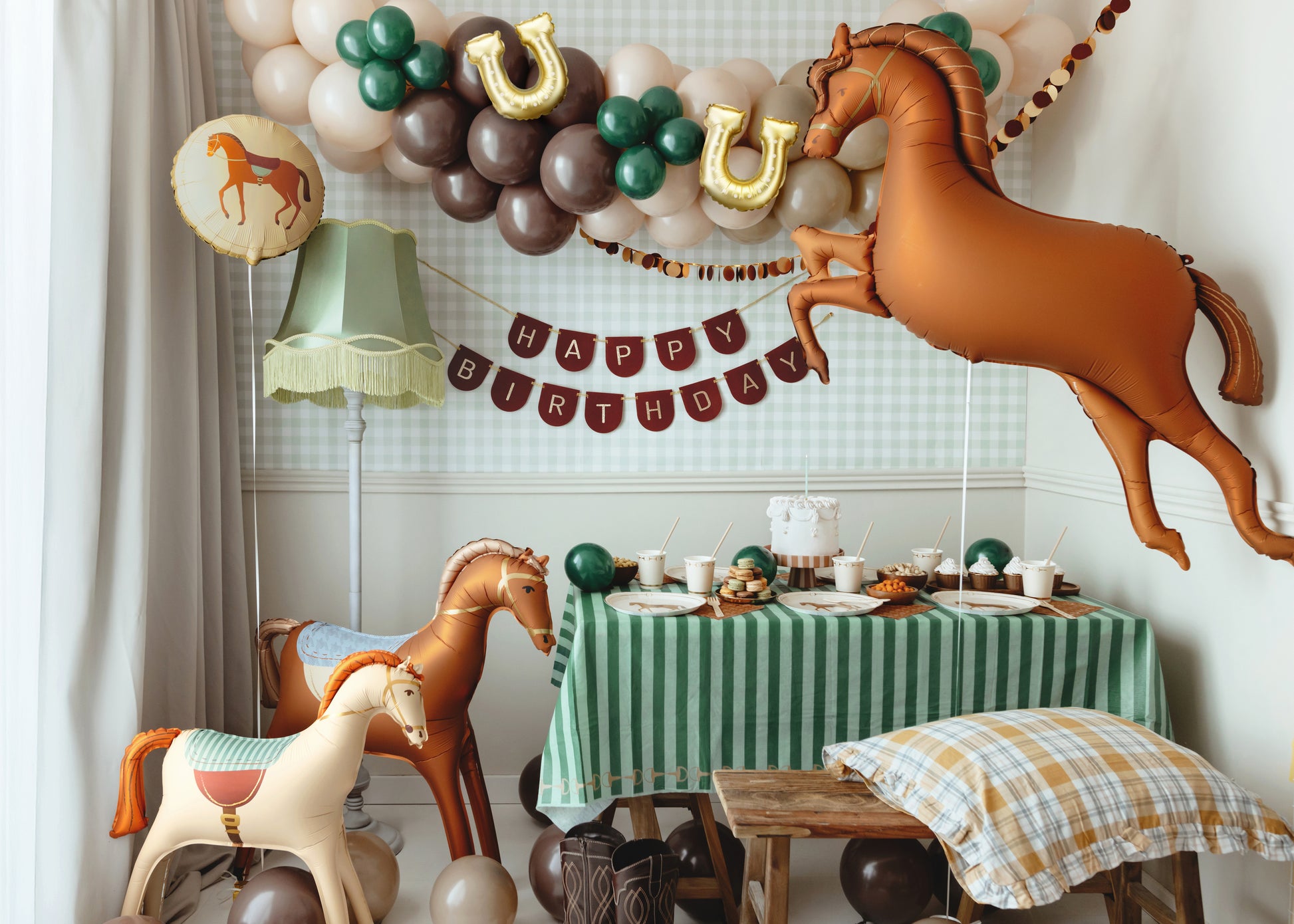 Western horse foil balloon party decor styled with cowboy birthday balloons in Toronto.