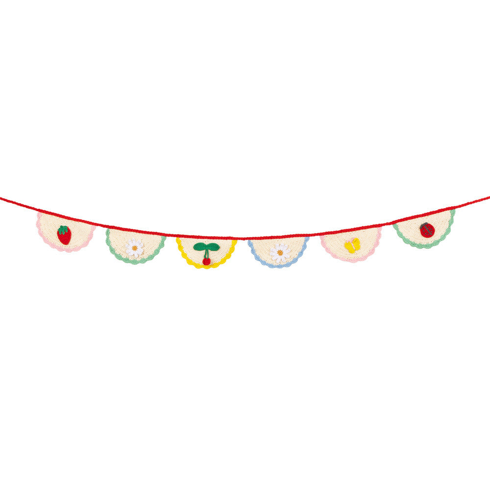 Meri Meri crochet scalloped garland with embroidered strawberries, cherries and florals, perfect for spring parties, available at our Toronto party shop.