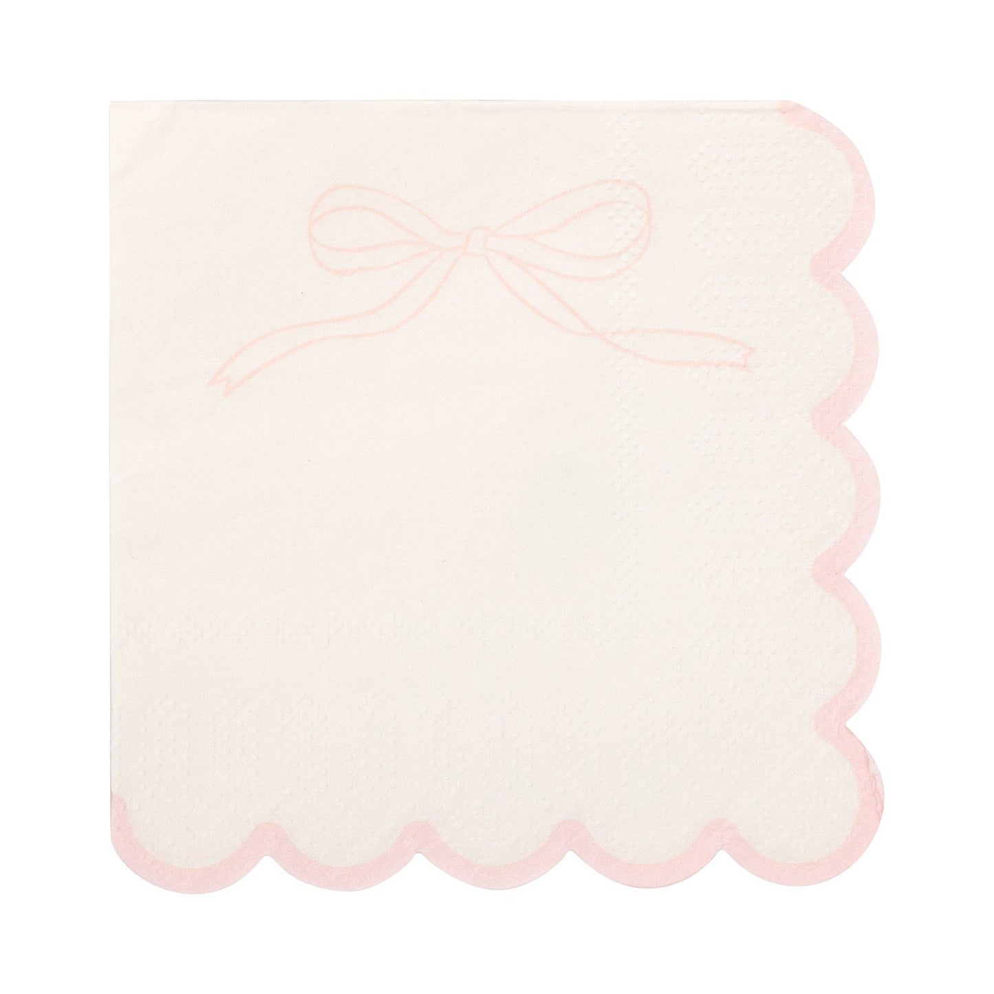 Close-up of a white cocktail napkin featuring a blush pink bow detail and scalloped border.