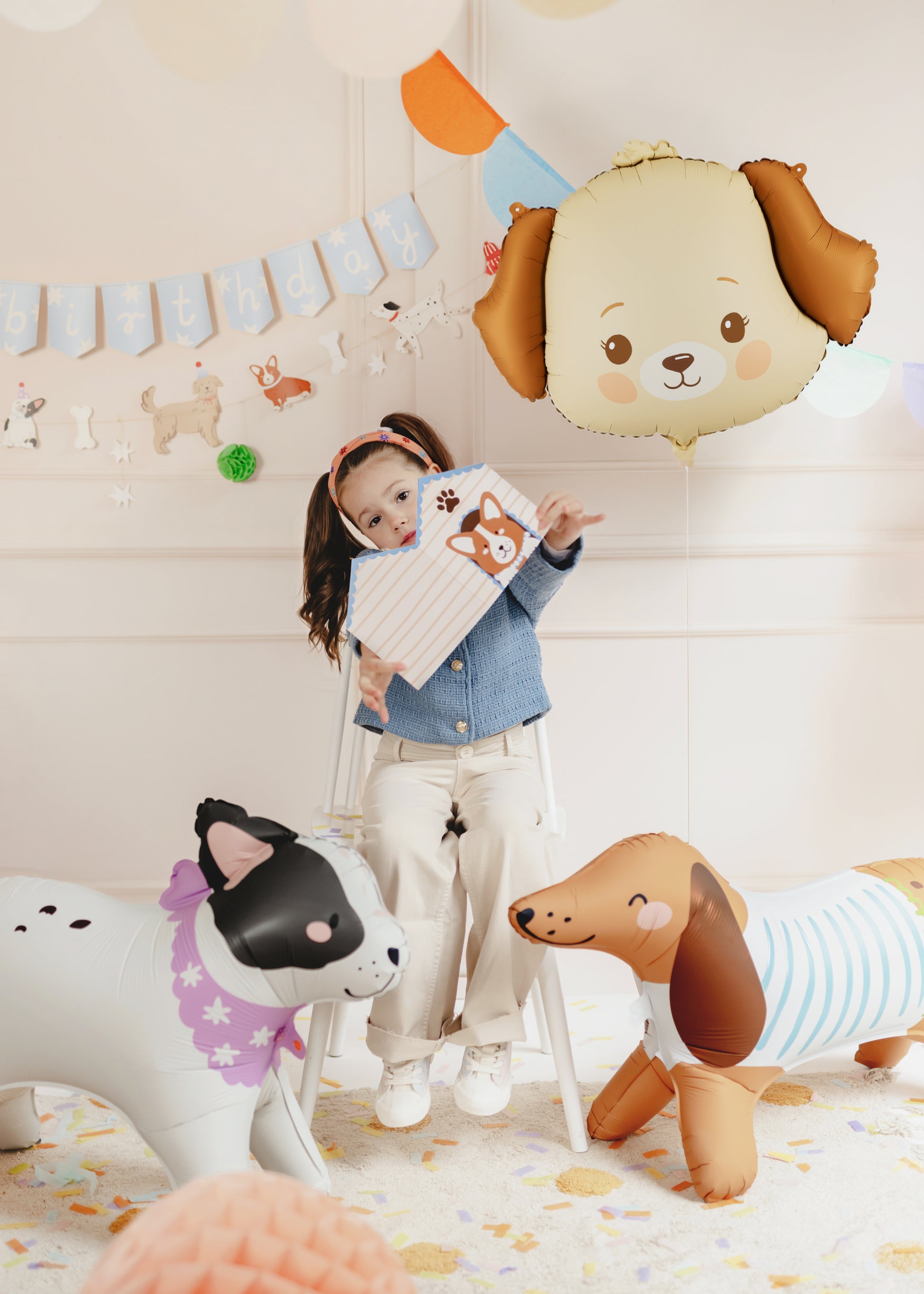 Puppy foil balloon styled in a dog themed kids birthday party setup, available at our Toronto party shop.
