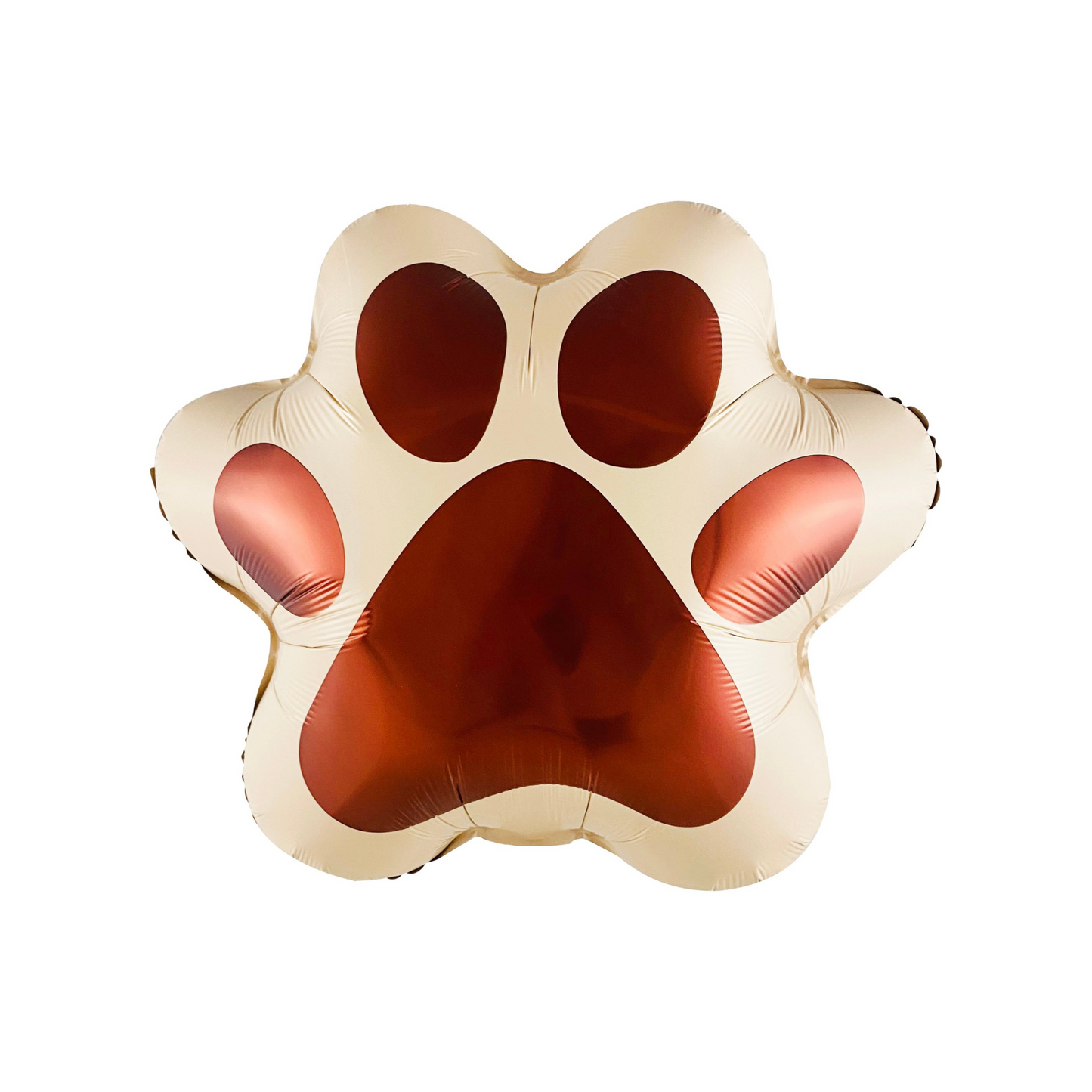 beige dog paw shaped balloon with brown paw print