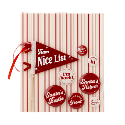 Toronto holiday elf pennant and red button set with phrases like “Santa’s Helper” and “Nice List.”