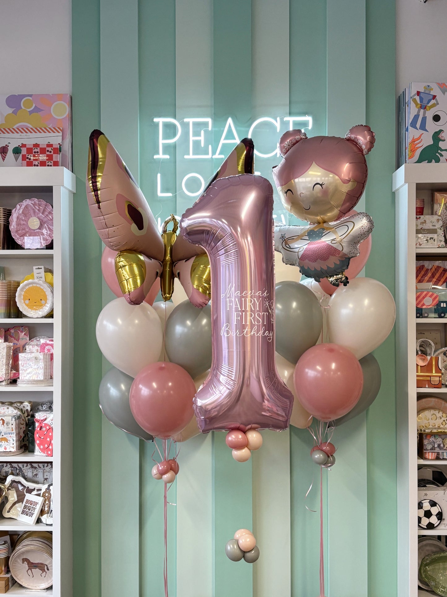 Fairy First Birthday Mini Kid Pop balloon display with soft pink, cream, and muted neutral balloons styled for a first birthday celebration in Toronto