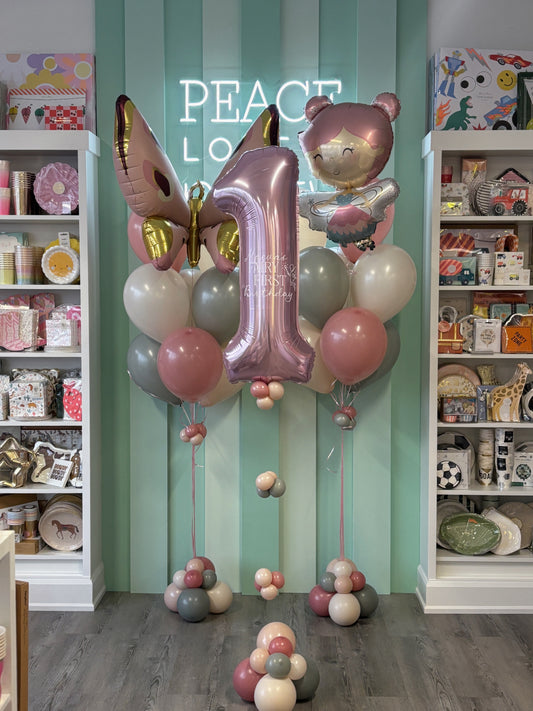 Fairy First Birthday Mini Kid Pop featuring a butterfly foil, fairy character balloon, soft pink and neutral balloons, and a jumbo number one, available in Toronto