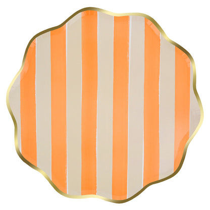 Burnt orange striped dinner plate with gold scalloped edge.