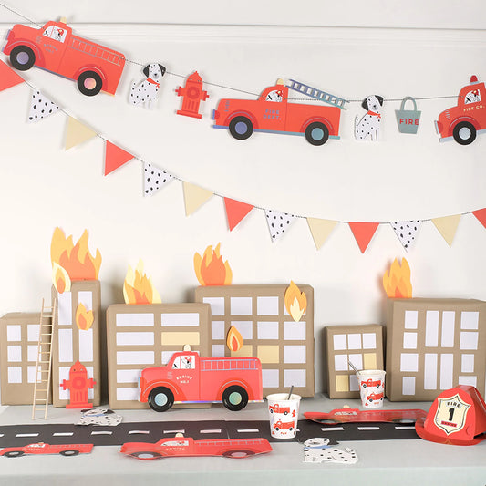 Fire Truck Garland styled in a fire truck birthday party setup available at our Toronto party shop