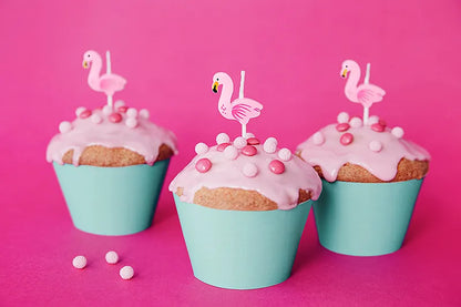 flamingo candles on cupcakes