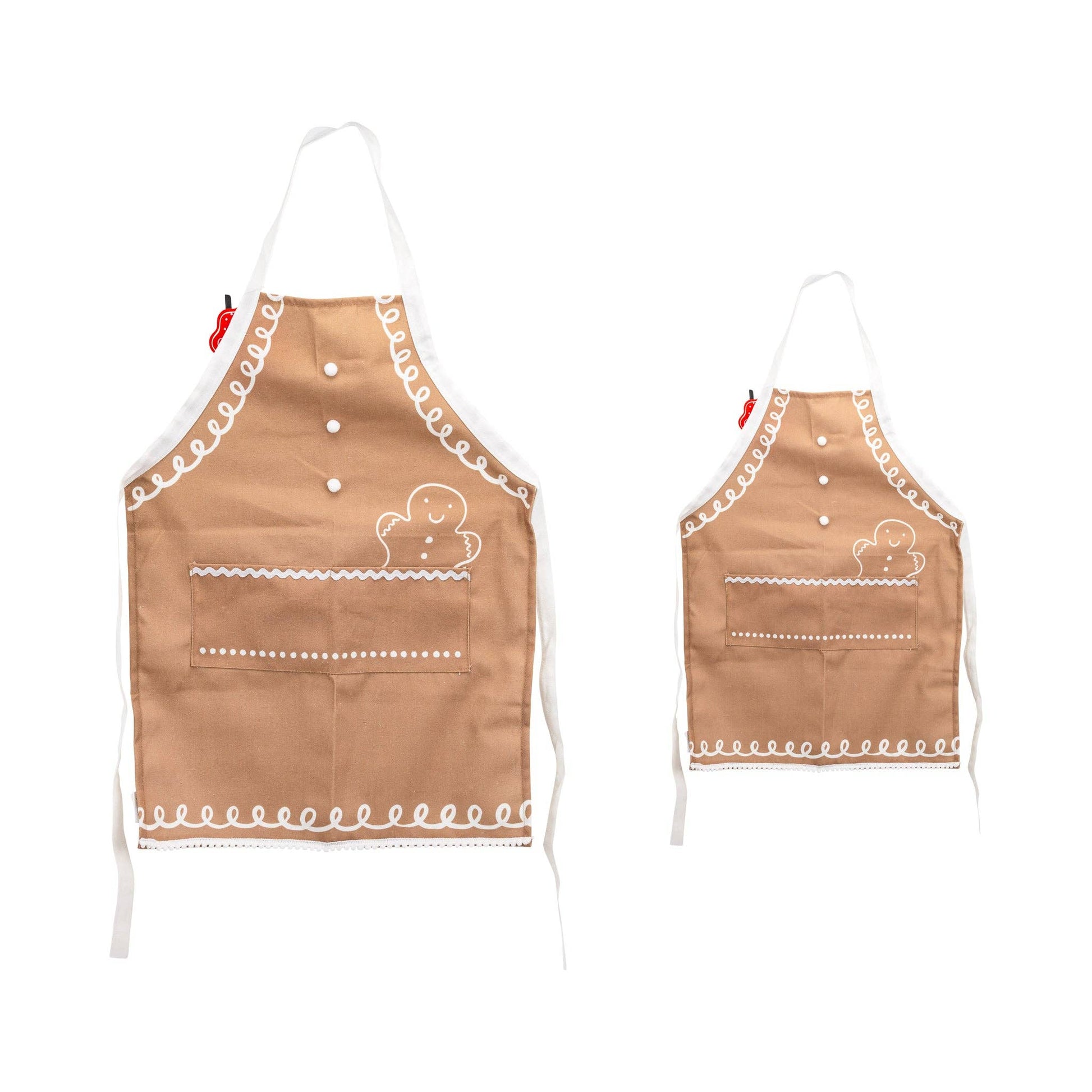 Two brown gingerbread aprons with white print on a white background