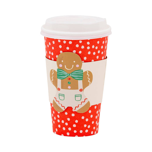 Red polka dot paper to-go cup with gingerbread sleeve, perfect for festive Christmas drinks, available in Toronto and shipping across Canada.