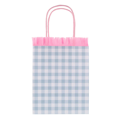 Blue gingham Meri Meri party bag with pink fringe trim and twisted paper handles, available at our Toronto party shop.