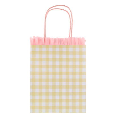 Yellow gingham Meri Meri party bag with pink fringe trim and twisted paper handles, available at our Toronto party shop.
