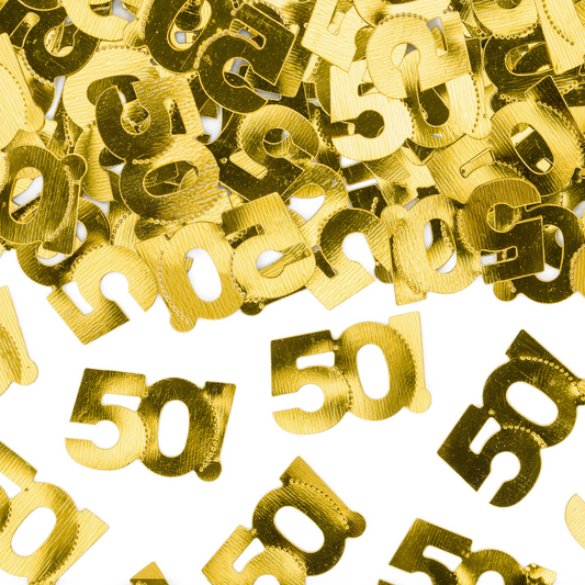 Close-up of shiny metallic gold “50” confetti pieces, perfect for 50th birthday or anniversary party decorations.