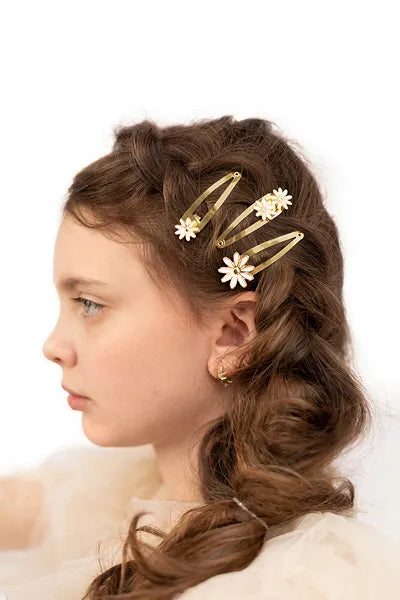 daisy hairclips in hair