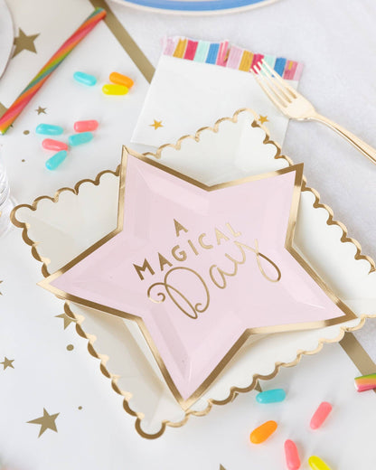 Gold stars paper table runner styled with pink star plates, scalloped gold trim partyware and colourful birthday decorations. Pick up in Toronto + Canada-wide shipping available.