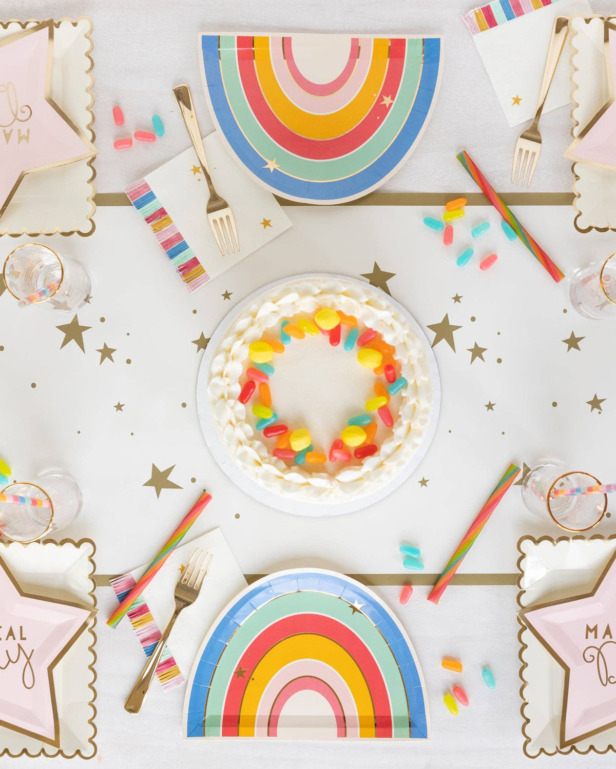 Cream and gold star paper table runner styled with rainbow birthday plates, pastel partyware and birthday cake. Pick up in Toronto + Canada-wide shipping available.