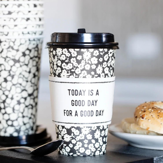 black and white floral to-go cup with today is a good day for a good day message on sleeve