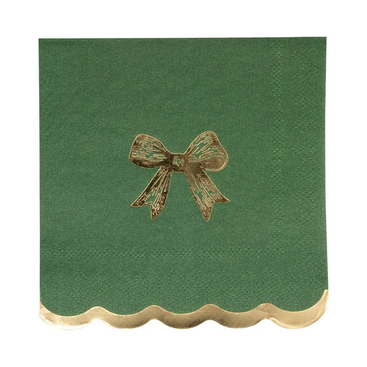  Green paper cocktail napkins with scalloped gold trim and gold foil bow, perfect for Toronto holiday parties.