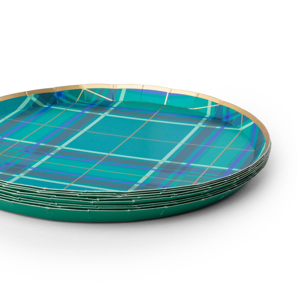 Close-up of green and blue plaid Christmas party plates with gold foil detailing
