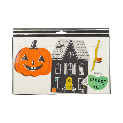 Halloween-themed banner packaging with a pumpkin and haunted house design.