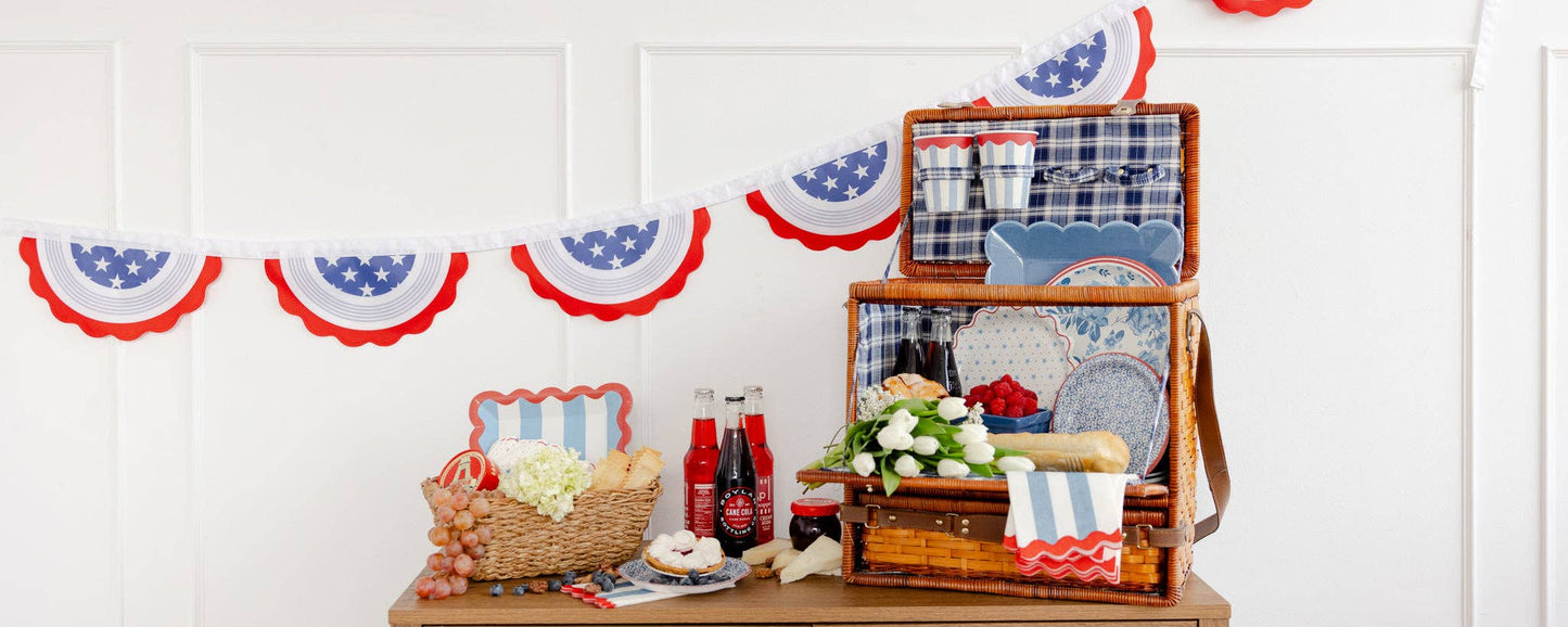 Set of eight Hamptons party cups styled among napkins and summery decor, available in Toronto and shipping across Canada.