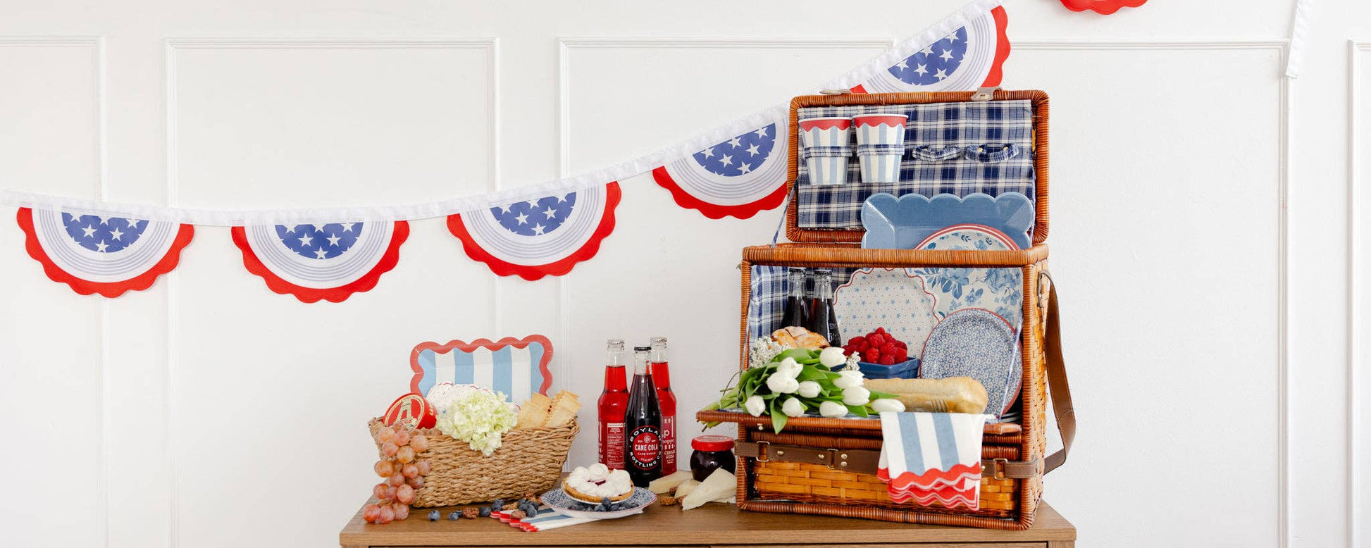Set of eight Hamptons party cups styled among napkins and summery decor, available in Toronto and shipping across Canada.