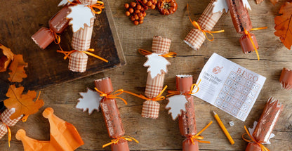 Harvest party crackers with dice game for Thanksgiving table