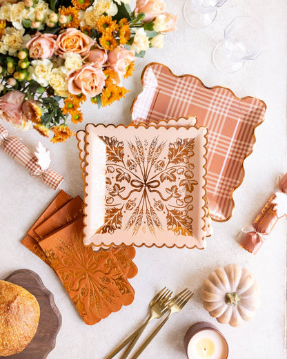 Thanksgiving table setting with harvest party crackers and fall tableware