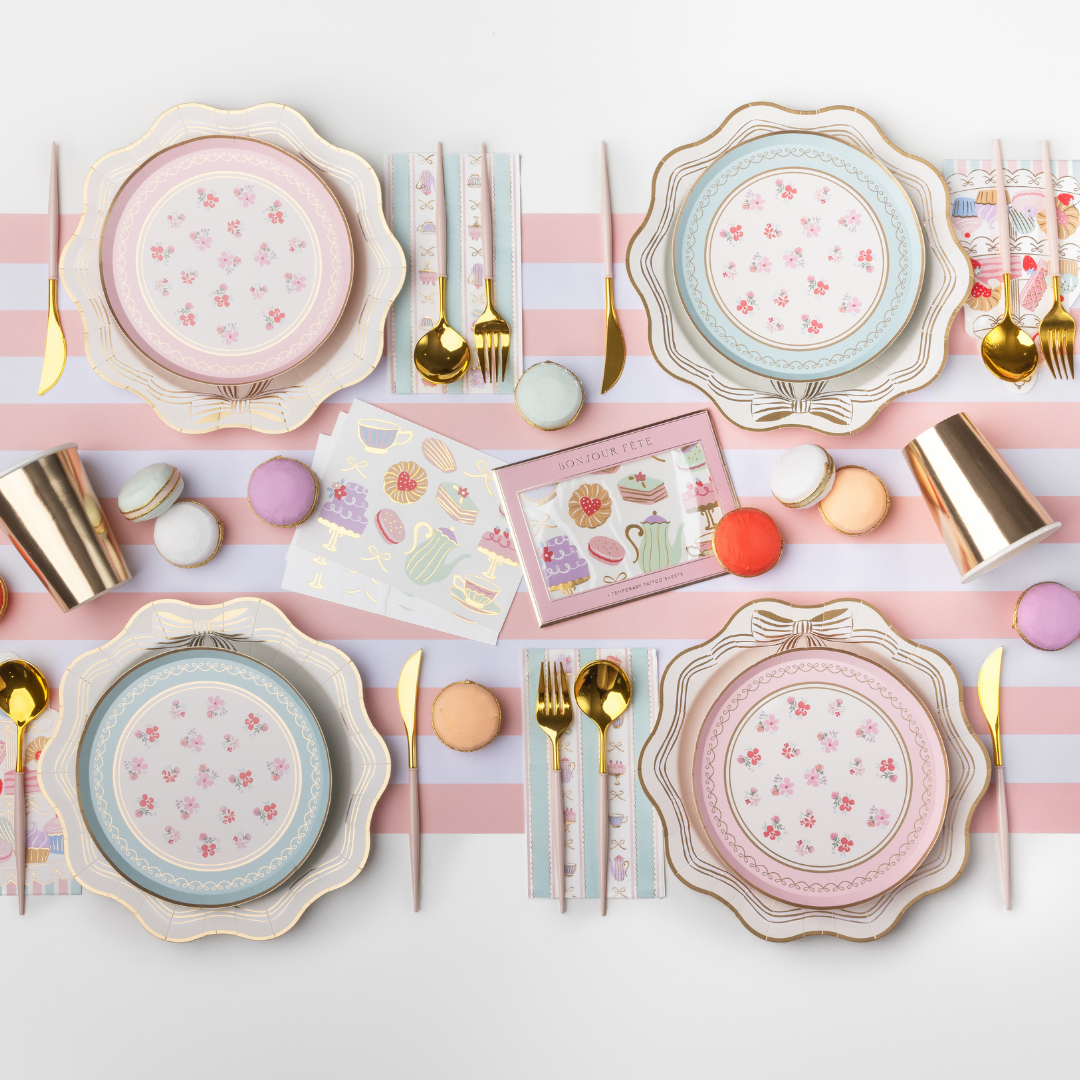 High Tea Patisserie party table with pastel plates, guest napkins and gold accents