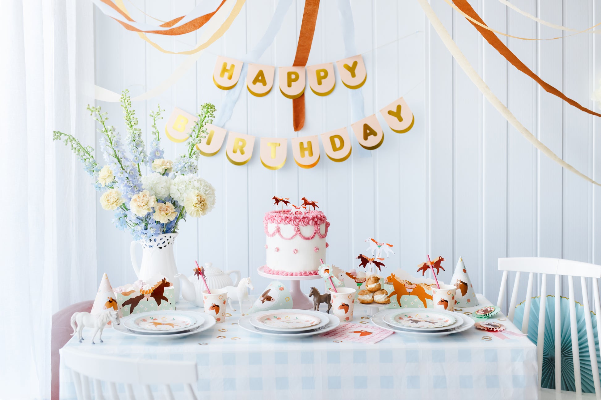 Pony-themed birthday party setup with pastel plates, cake, and décor, styled and sold by Confetti My Party Toronto