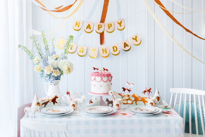 Pony-themed birthday party setup with pastel plates, cake, and décor, styled and sold by Confetti My Party Toronto