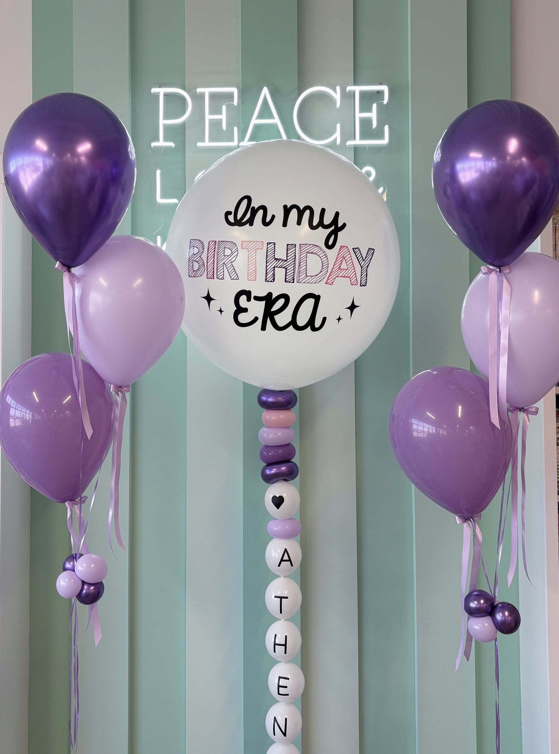 Close-up of lavender and purple “In My Birthday Era” jumbo balloon with modern script lettering, available in Toronto for local pickup and delivery.