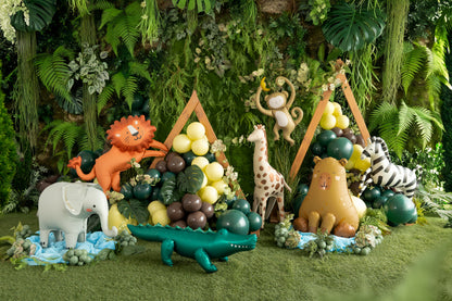 Jungle-themed party setup with crocodile, giraffe, and animal balloons, perfect for kids’ birthdays available at our Toronto party shop.