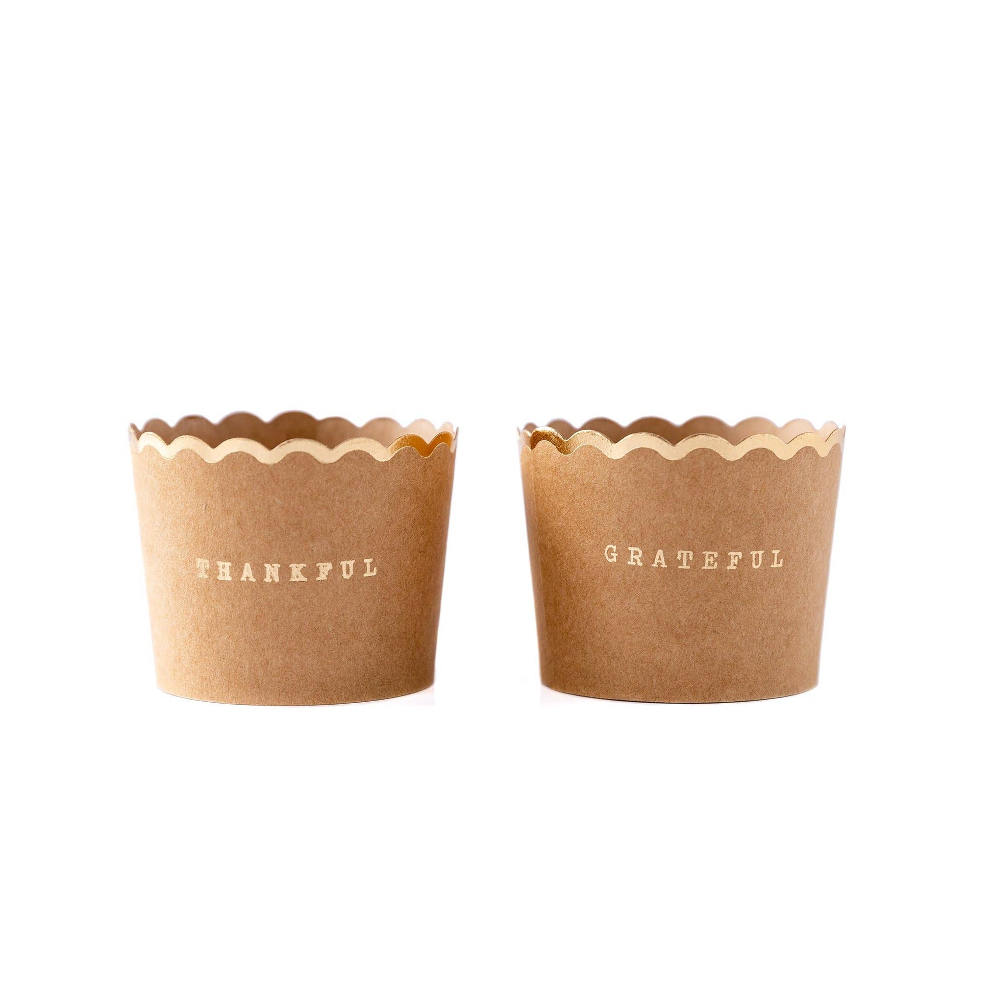 Kraft baking cups with scalloped edge and gold foil lettering “Thankful” and “Grateful,” available at our Toronto party shop.