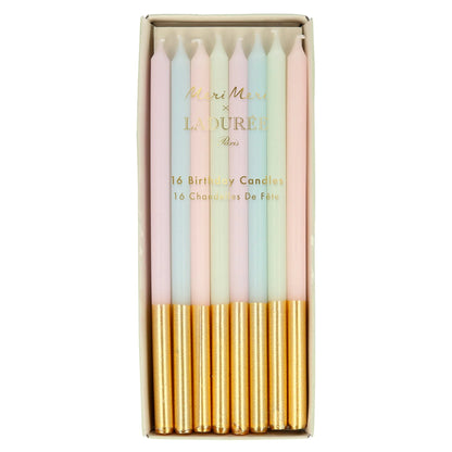 gold dipped candles in pastel colours