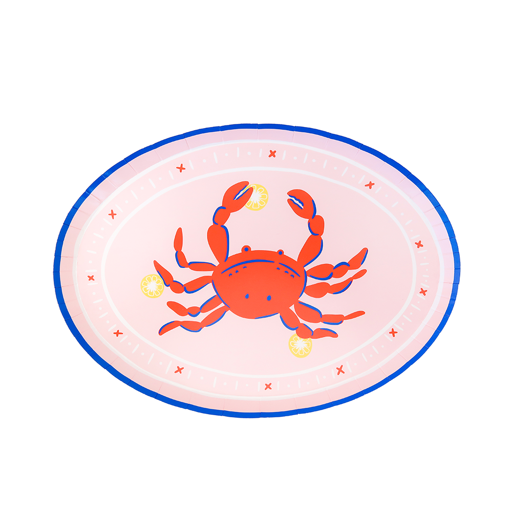 Oval-shaped pink plate with a red crab design on a white background