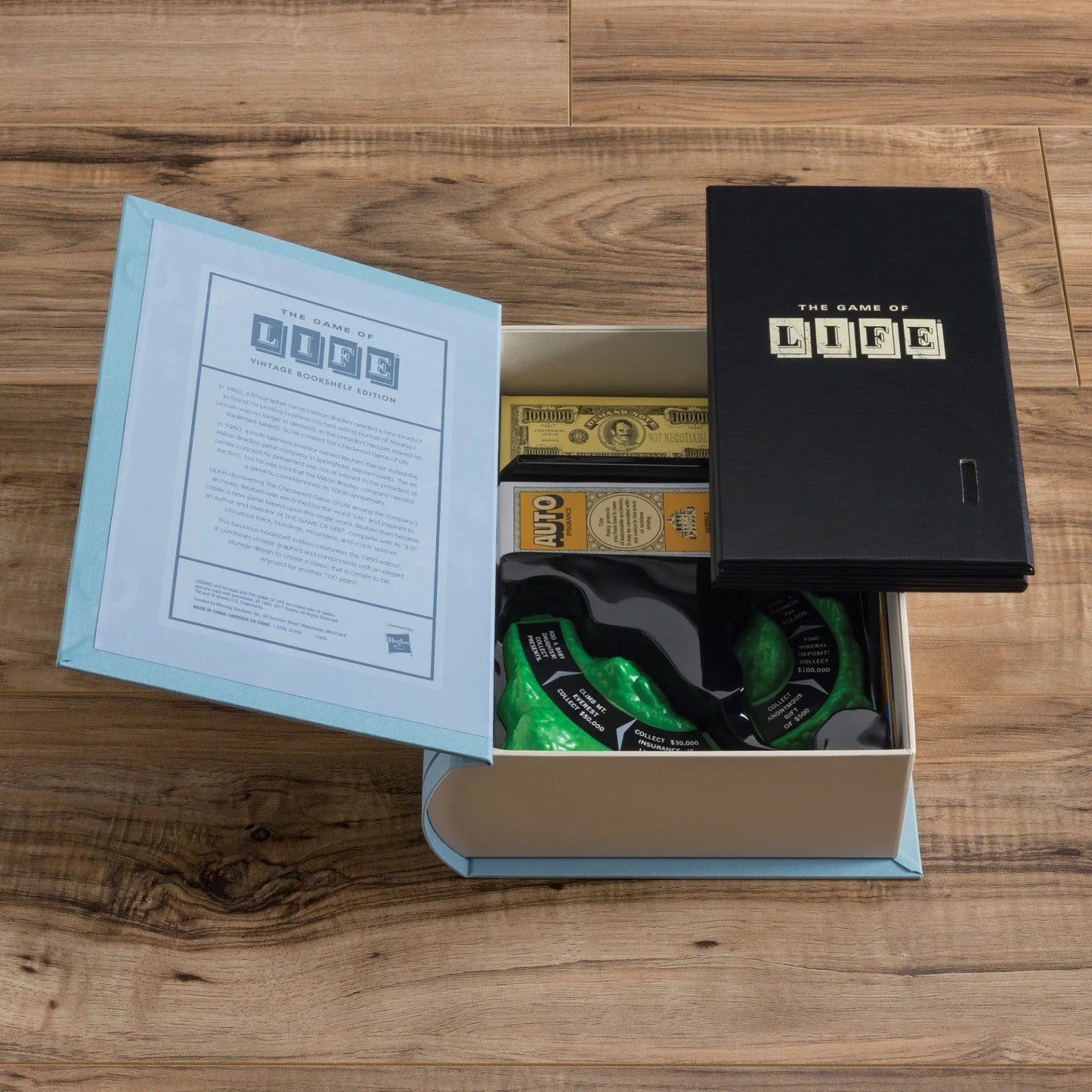 The Game of Life Vintage Bookshelf Edition open displaying the book case.