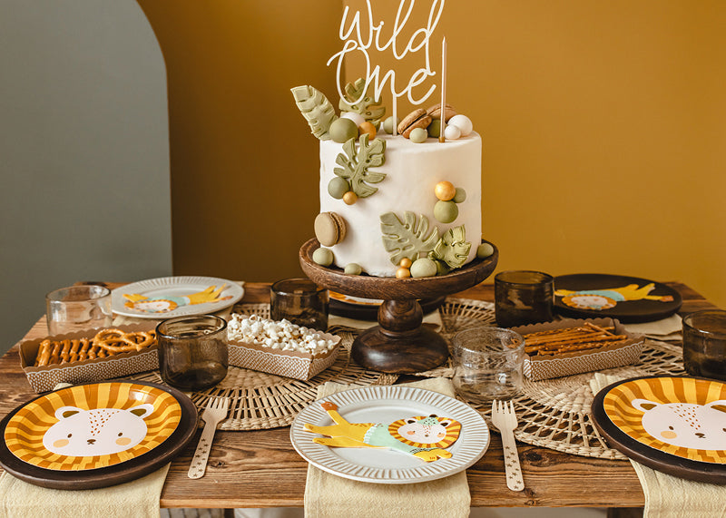 wild one table setting with cake and plates