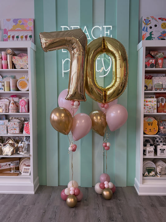 Gold 70 luxe number balloon bundle with pink, blush and gold balloons, styled in our Toronto balloon shop for milestone birthday celebrations.