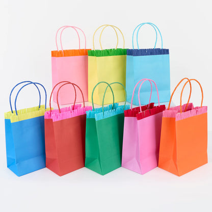 Meri Meri colourful fringed paper party bags arranged together