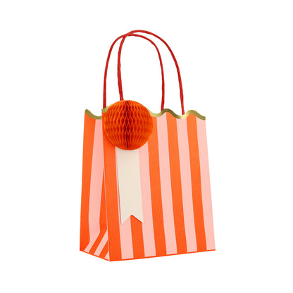 Meri Meri orange striped party bag with red honeycomb gift tag