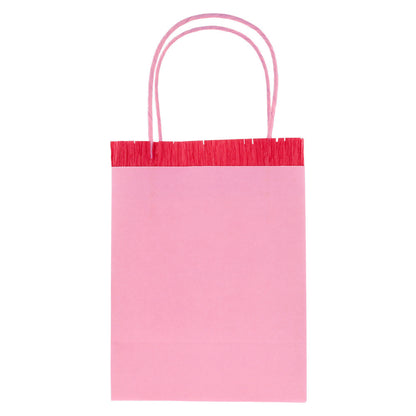 Meri Meri pink paper party bag with red fringe
