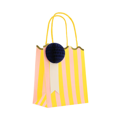 Meri Meri yellow striped party bag with navy honeycomb gift tag