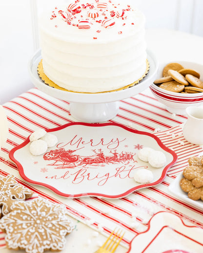 Merry and Bright bamboo tray styled with peppermint cake and cookies on red striped holiday table. Sold at Confetti My Party and fast shipping Canada-wide.
