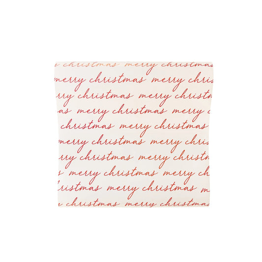 red ' merry christmas' script on a white paper table runner 