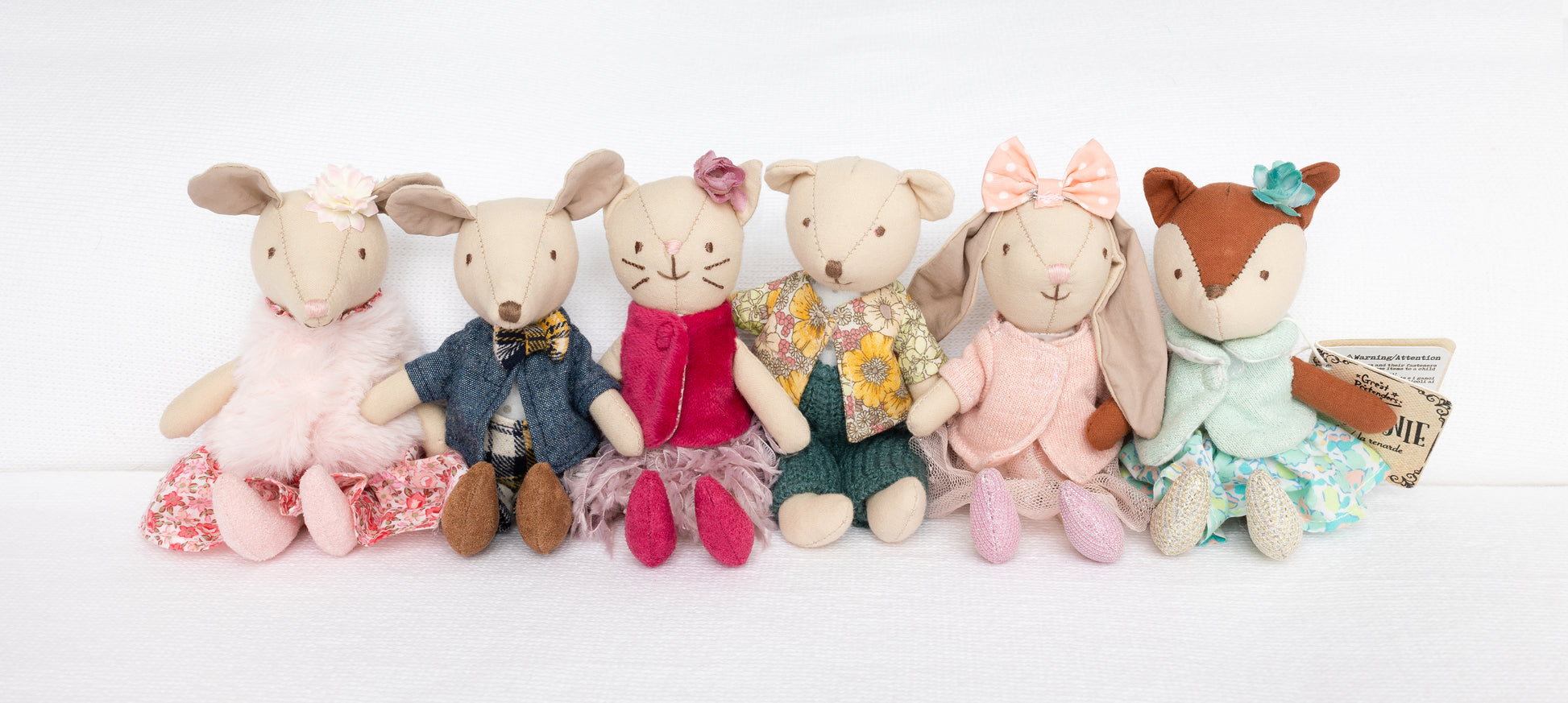 mini stuffed dolls and friends