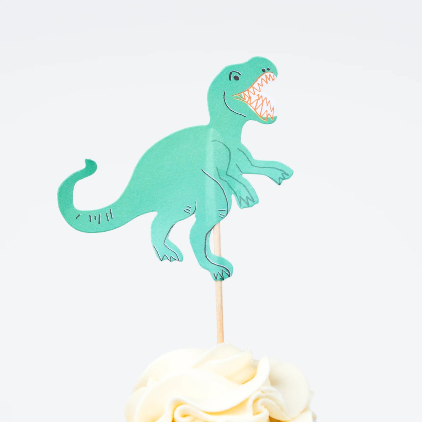 Meri Meri green dinosaur cupcake topper with wooden stick, available at Confetti My Party and ships across Canada.