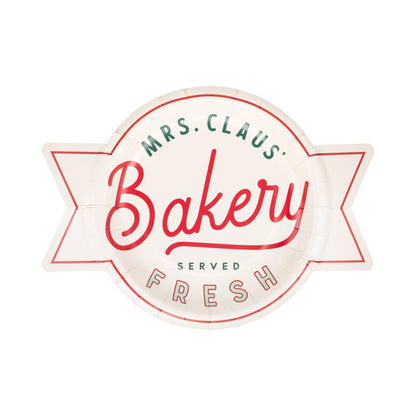 Toronto Christmas dessert plate shaped like a vintage bakery sign with “Mrs. Claus Bakery Served Fresh” design.