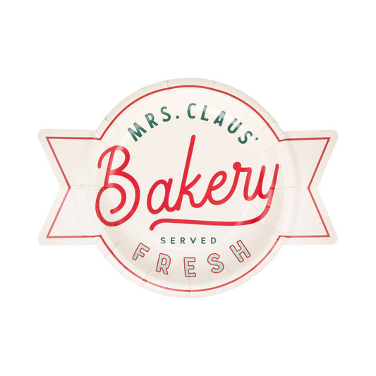 Toronto Christmas dessert plate shaped like a vintage bakery sign with “Mrs. Claus Bakery Served Fresh” design.
